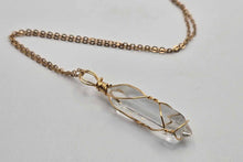 Load image into Gallery viewer, Radiant Elegance: Gold Wire-Wrapped Clear Quartz Point Necklace