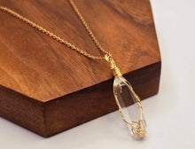 Load image into Gallery viewer, Radiant Elegance: Gold Wire-Wrapped Clear Quartz Point Necklace