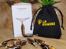 Load image into Gallery viewer, Silver Wire Wrapped Tiger's Eye Healing Crystal Point Necklace