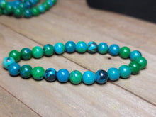 Load image into Gallery viewer, Stunning Phoenix Chrysocolla Bracelets 8mm For empowerment, communication courage