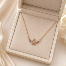 Load image into Gallery viewer, Rose Gold Angel Wings Necklace, Round Moissanite Crown Pendant, Dainty 18-Inch Adjustable Chain, Celestial Gift for Her
