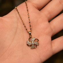 Load image into Gallery viewer, Gold Pinwheel Flower Necklace, Sparkling Crystal Pendant, 18 Inch Adjustable Chain, Elegant Gift for Her

